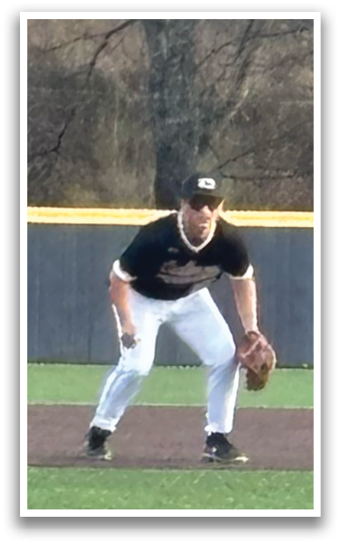 A baseball player is crouching on the field, wearing a black shirt and white pants. He is holding a baseball glove, ready to catch the ball. AI generated content