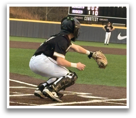 A baseball player is sliding into a base, wearing a black helmet and white pants. AI generated content