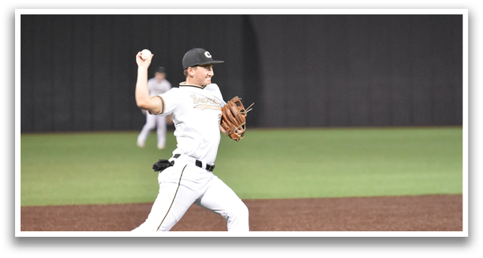 A baseball player in a white uniform is throwing a ball on a field. AI generated content