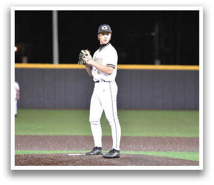 A baseball player in a white uniform stands on the pitcher's mound, holding a baseball glove. AI generated content
