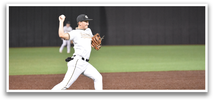 A baseball player in a white uniform is throwing a ball on a field. AI generated content
