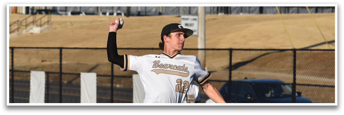 A baseball player in a white uniform is pitching a ball on a field. AI generated content