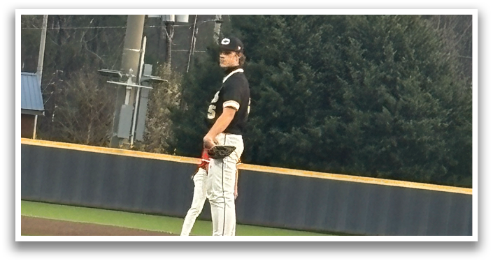 A baseball player is standing on the pitcher's mound, holding a baseball glove. AI generated content