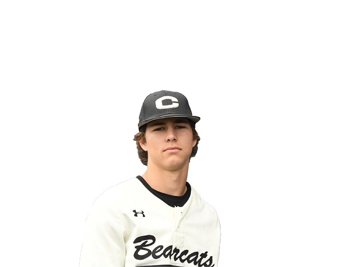 A man wearing a white baseball uniform with the number 11 on the back. AI generated content