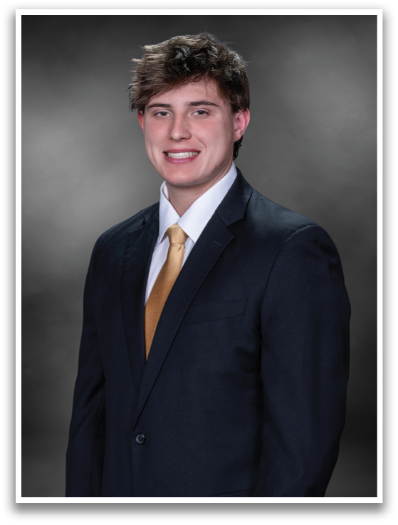 A man wearing a suit and tie smiles for the camera. AI generated content