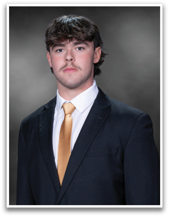 A man wearing a suit and tie stands in front of a black background. AI generated content