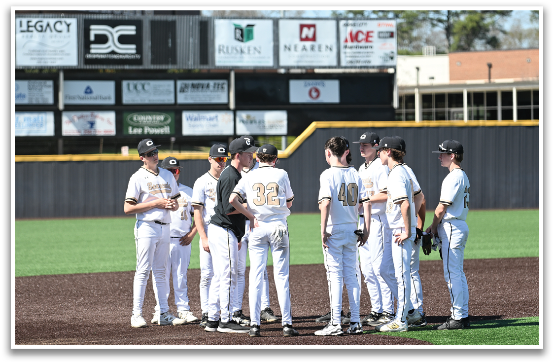 Baseball players wearing white uniforms and black caps standing on a field. AI generated content