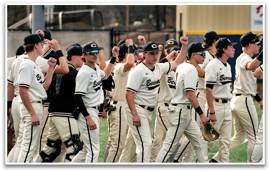 A group of baseball players are standing on a field, wearing their uniforms and holding their gloves. AI generated content