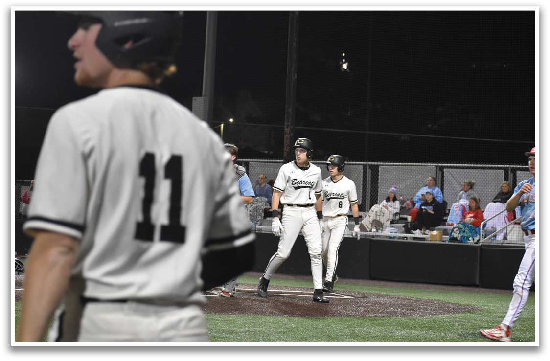 A baseball game is in progress with a player wearing a number 11 jersey. AI generated content