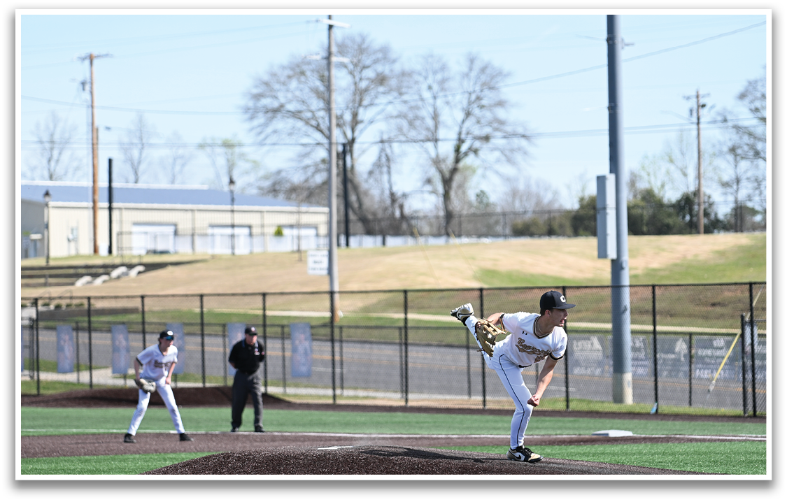 A baseball player in a white uniform is pitching a ball on a field. AI generated content