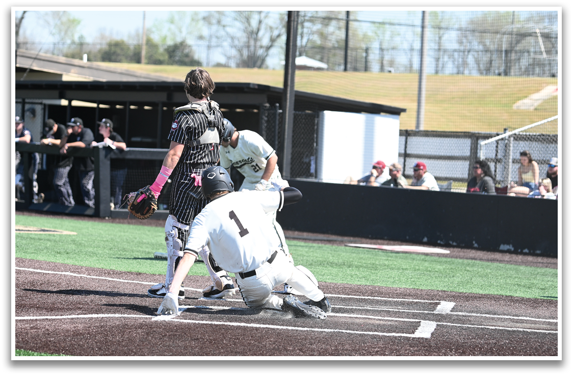 A baseball player is sliding into home plate, while the catcher is trying to tag him out. AI generated content