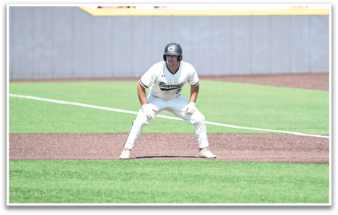 A baseball player is standing on the field, wearing a helmet and holding a bat. AI generated content