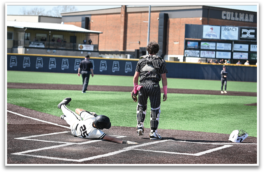 A baseball player slides into home plate during a game. AI generated content