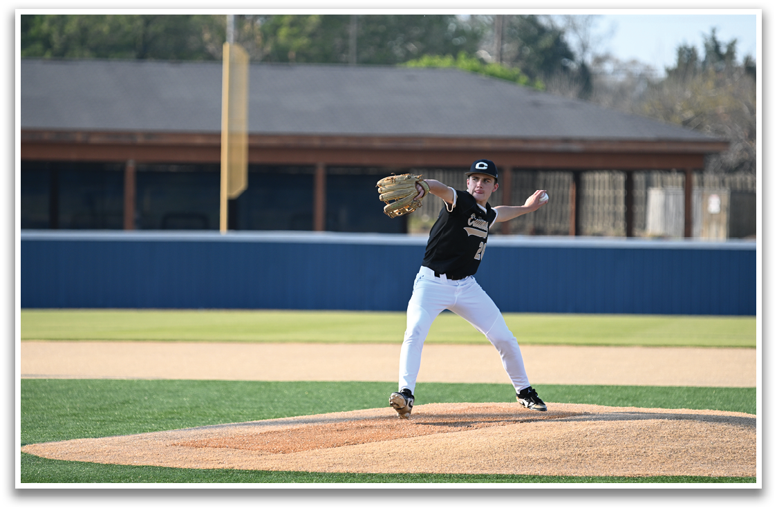 A baseball player in a black shirt and white pants is pitching a ball on a baseball field. AI generated content