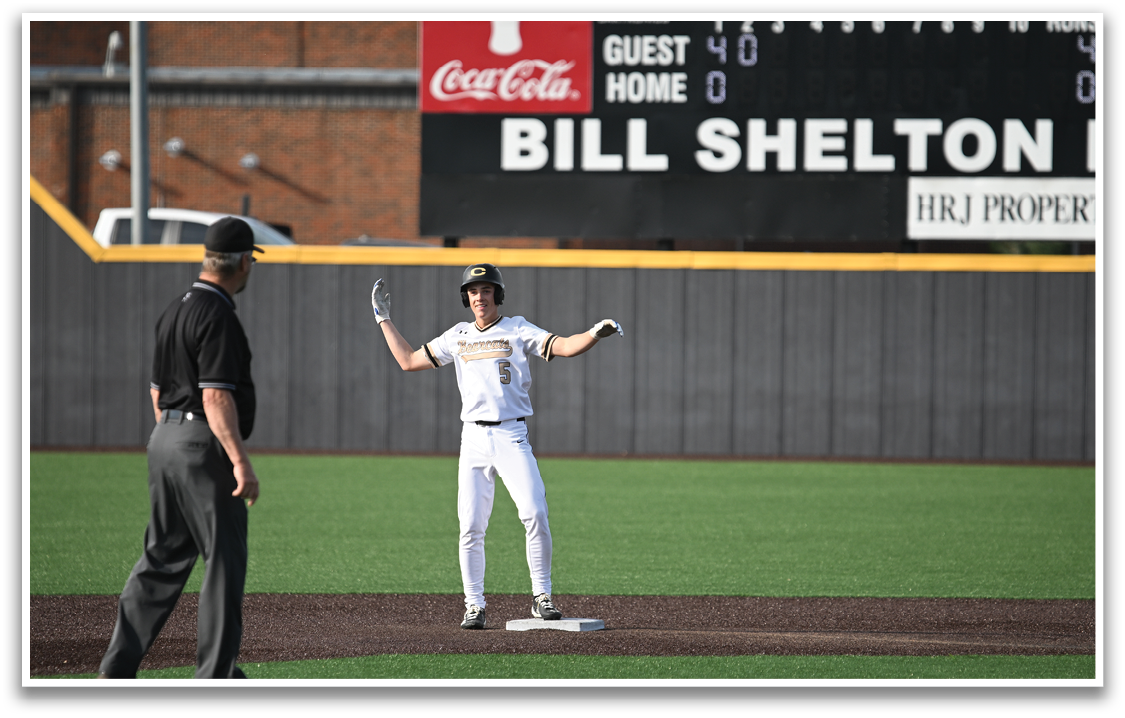 A baseball player is standing on a base, holding his glove up in the air. AI generated content
