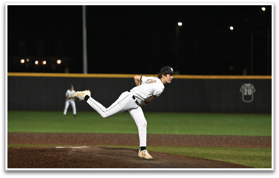 A baseball player in a white uniform is pitching a ball on a field. AI generated content