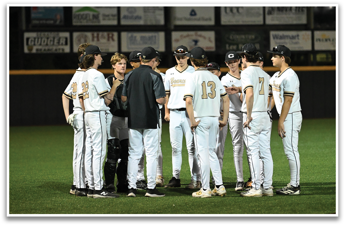A group of baseball players huddled together on the field. AI generated content
