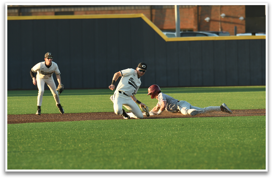 A baseball player slides into a base while another player tries to catch the ball. AI generated content