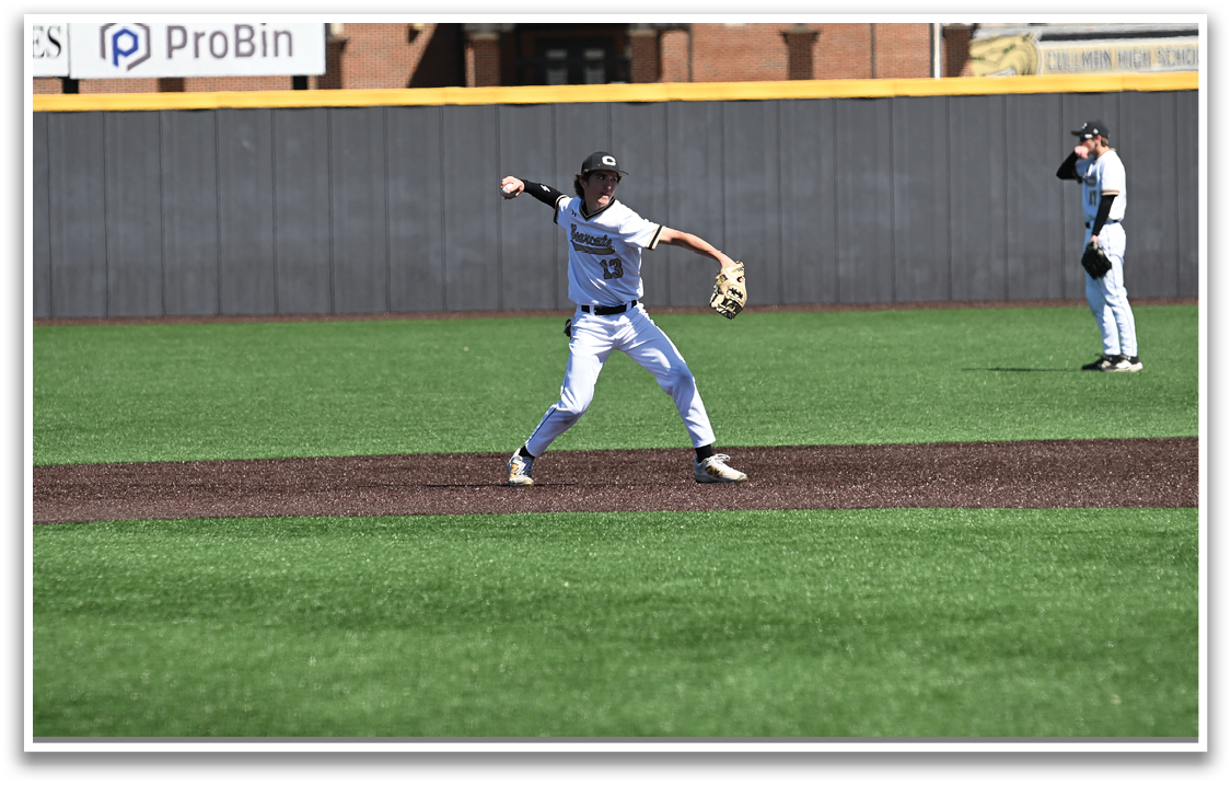A baseball player in a white uniform is throwing a ball on a field. AI generated content