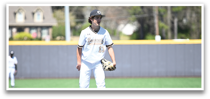 A baseball player in a white uniform stands on the pitcher's mound, holding a baseball glove. AI generated content