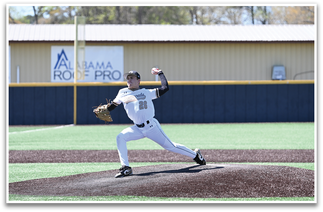 A baseball player in a white uniform is pitching a ball on a field. AI generated content