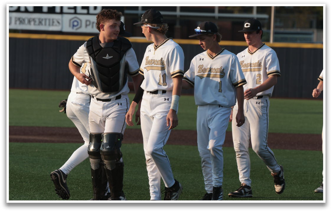 A group of baseball players walking on the field. AI generated content