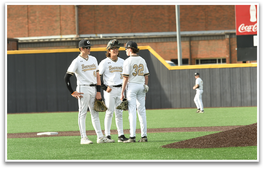 Three baseball players wearing white uniforms and black hats are standing on a baseball field. AI generated content