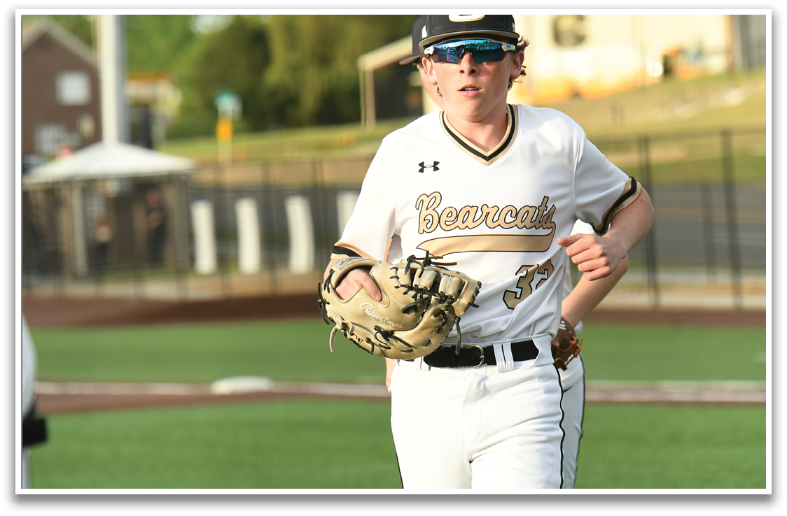A baseball player wearing a white uniform and a catcher's mitt is running on the field. AI generated content