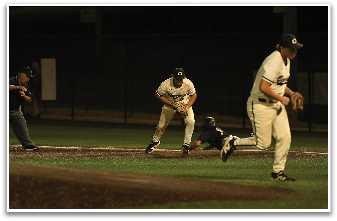A baseball player slides into home plate while another player tries to catch the ball. AI generated content