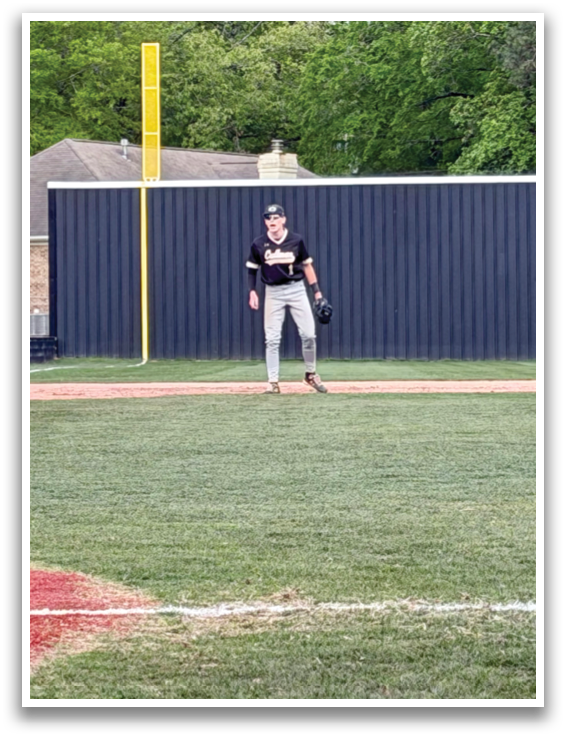 A baseball player is standing on the field, holding a baseball glove. AI generated content