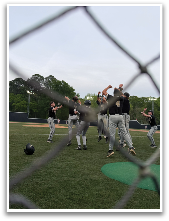 A group of men playing baseball on a field. AI generated content