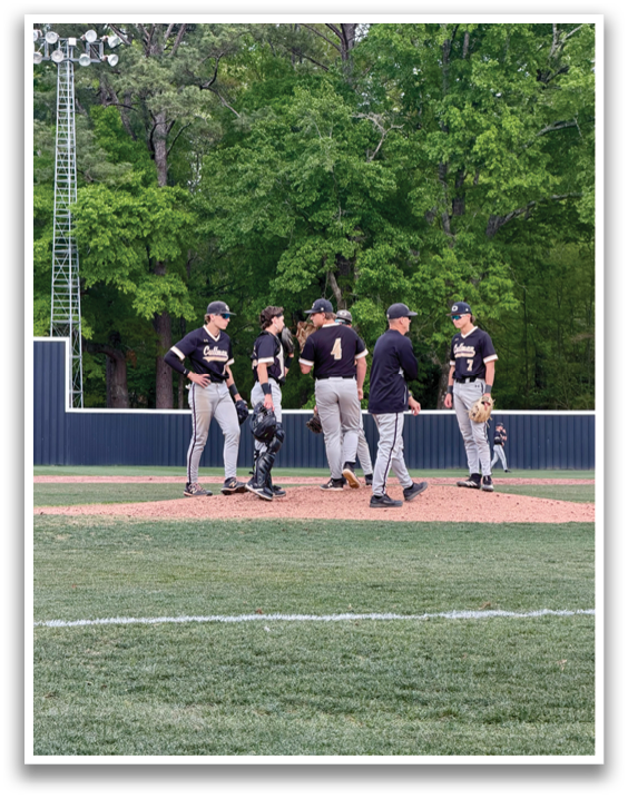 Baseball players on the field, some wearing black shirts and others wearing gray pants. AI generated content