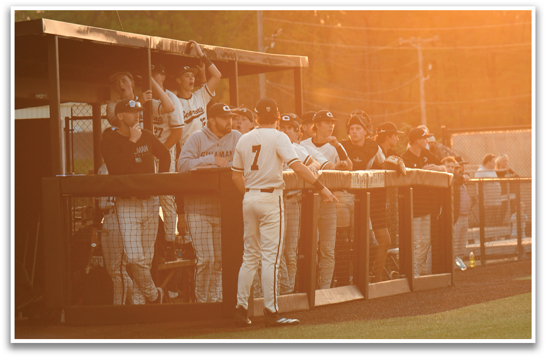 Baseball players in dugout, some wearing number 7. AI generated content