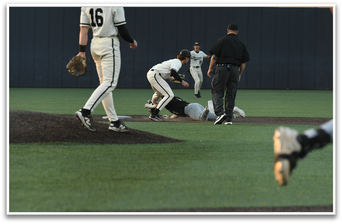 A baseball player is swinging a bat on a field. AI generated content