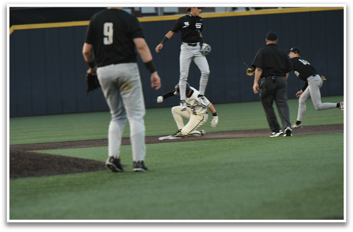 A baseball player slides into home plate while the catcher tries to tag him out. AI generated content