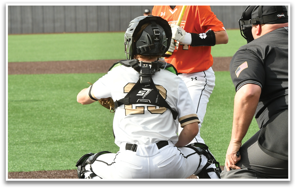 A baseball game is in progress with a batter swinging a bat at a ball. The catcher is positioned behind the batter, ready to catch the ball. The umpire is also present, closely observing the play. AI generated content