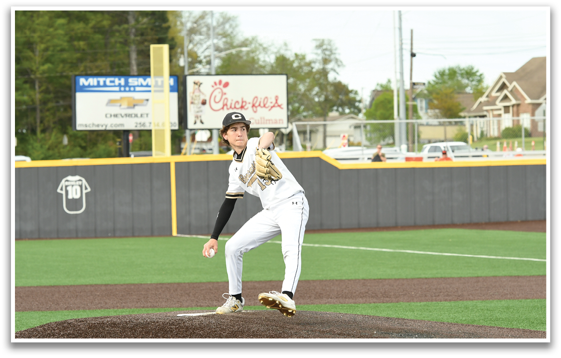 A baseball player in a white uniform is pitching a ball on a field. AI generated content