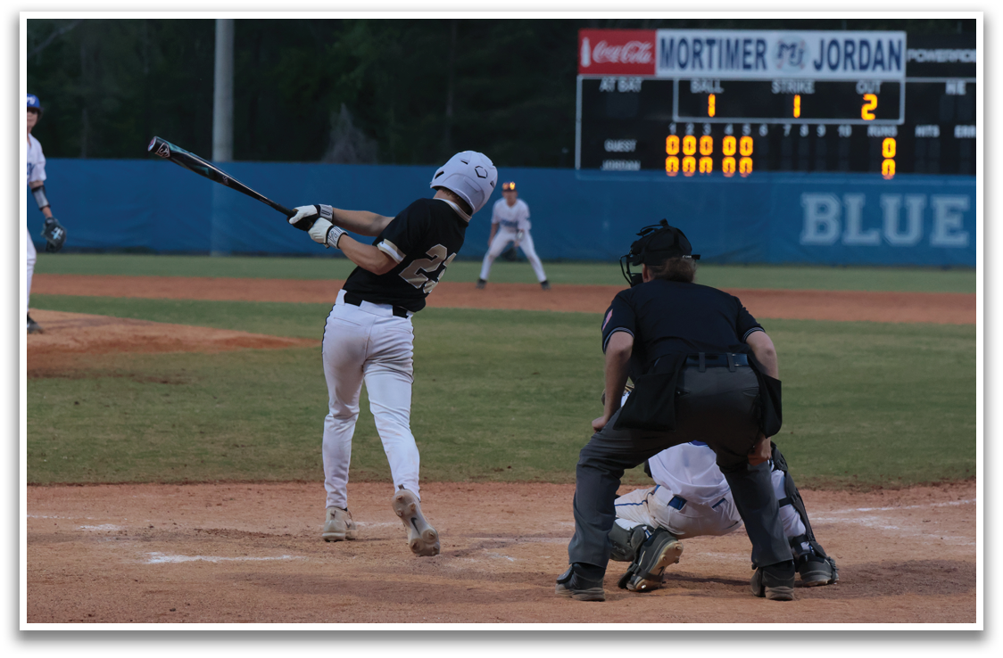 A baseball player is swinging a bat at a ball. AI generated content