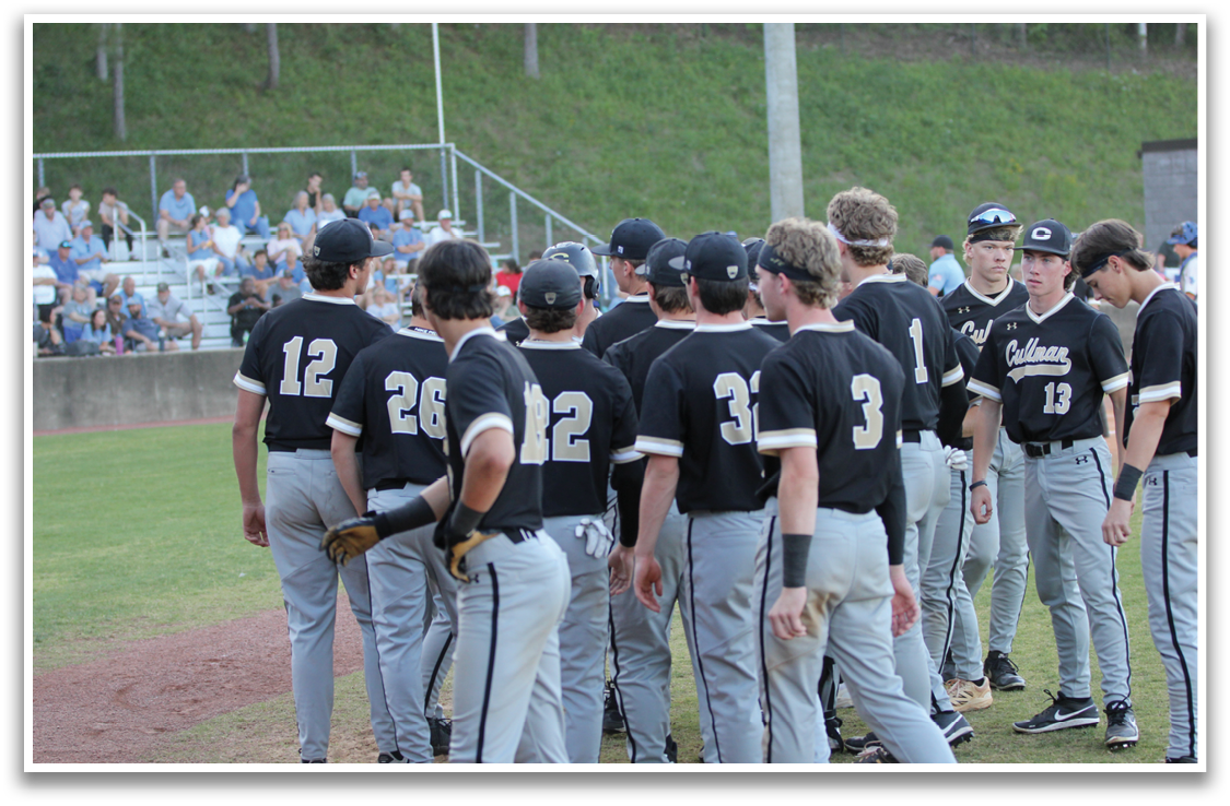 Baseball players wearing black jerseys and grey pants standing on a field. AI generated content