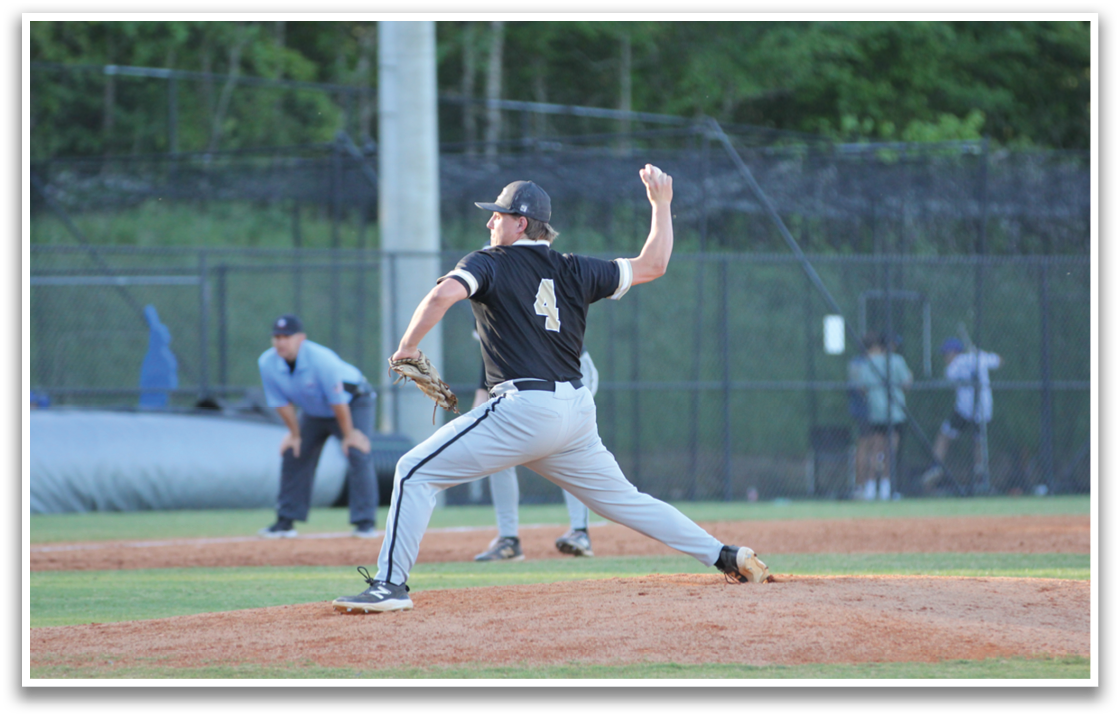 A baseball player in a black shirt and grey pants is pitching a ball. AI generated content
