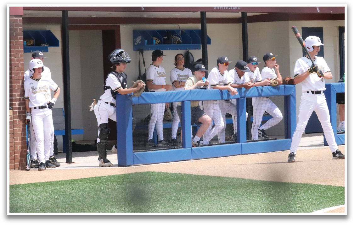 A baseball player is holding a bat, ready to swing. AI generated content