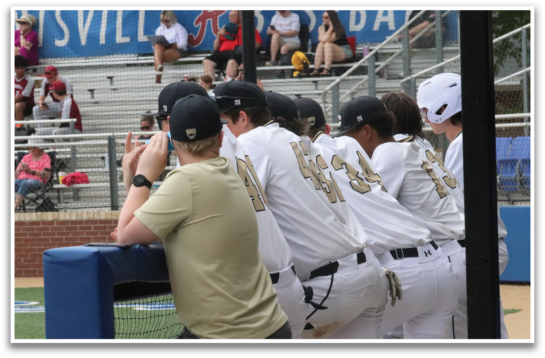 Baseball players in uniforms sitting on a bench. AI generated content
