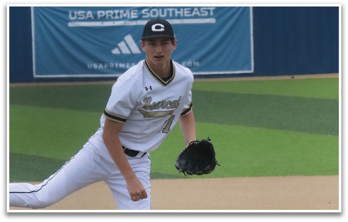 A baseball player in a white uniform is pitching a ball on a field. AI generated content