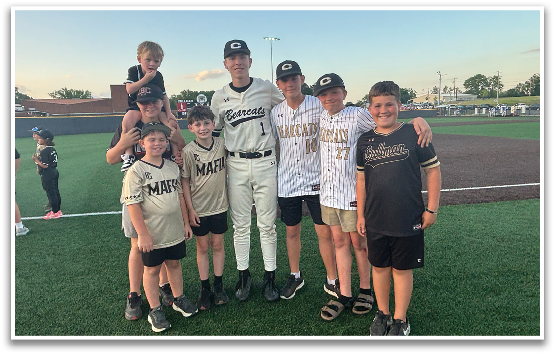 A group of children posing for a photo on a baseball field. AI generated content