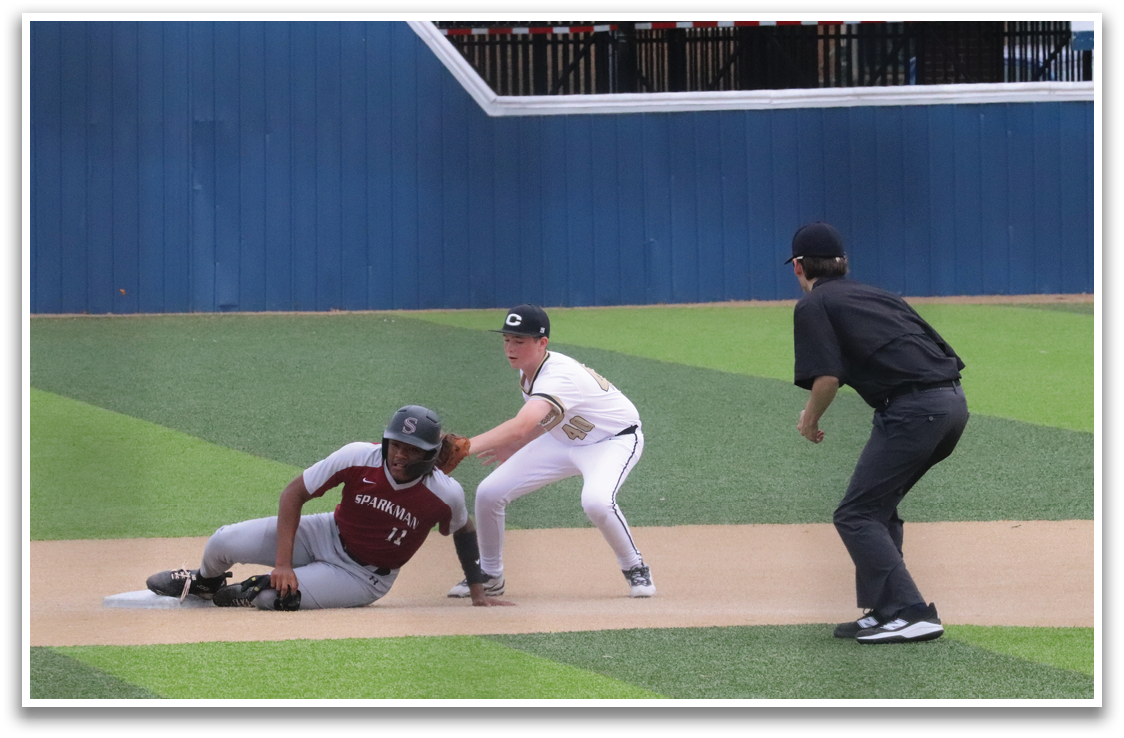 A baseball player slides into a base while the catcher tries to tag him out. AI generated content