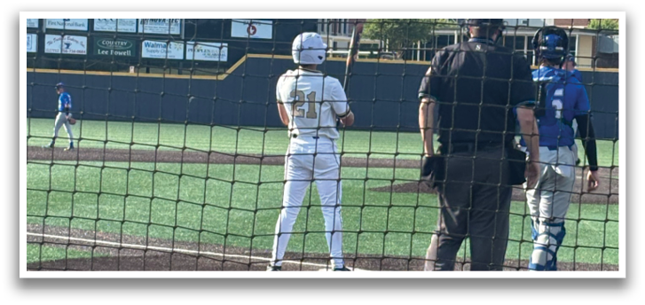 A baseball player is standing at home plate, holding a bat, and waiting for the pitch. AI generated content