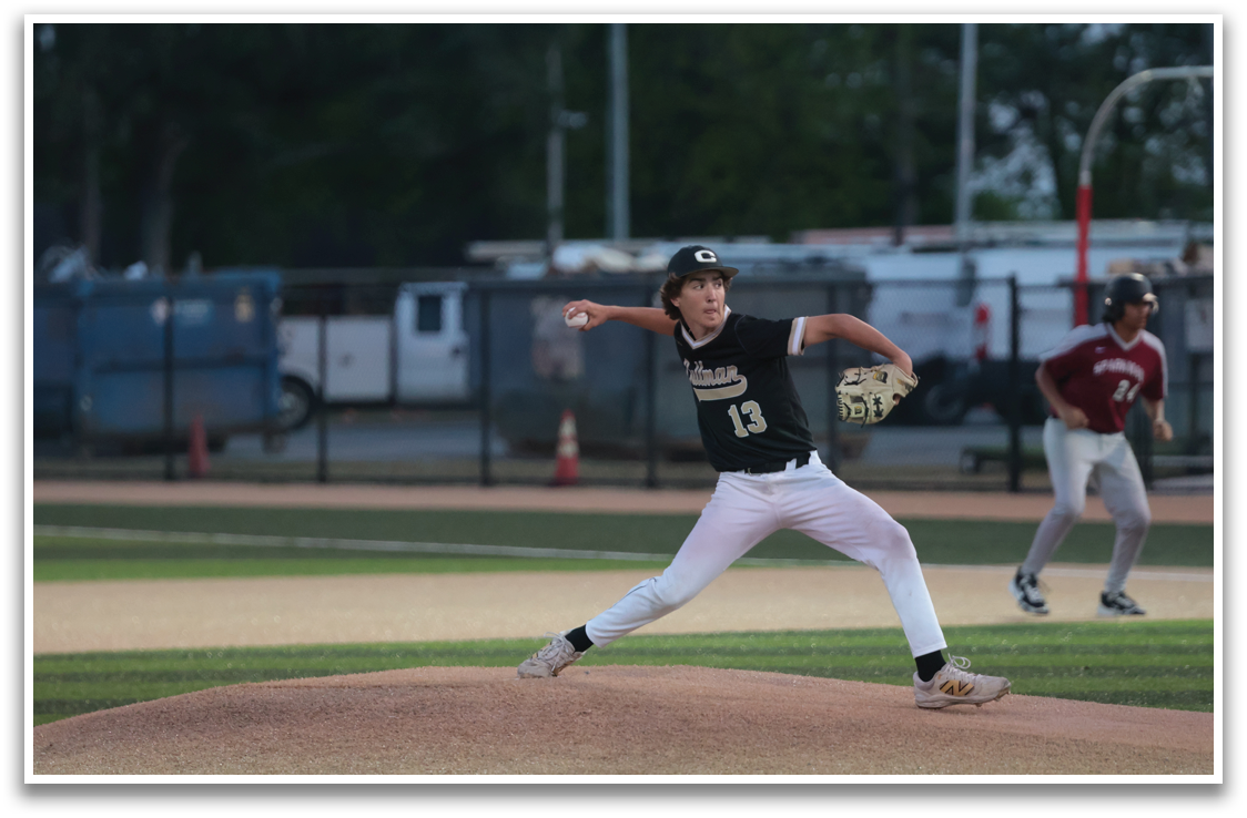A baseball player in a black shirt and white pants is pitching a ball on a field. AI generated content