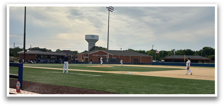 A baseball game is taking place on a field with several players. AI generated content