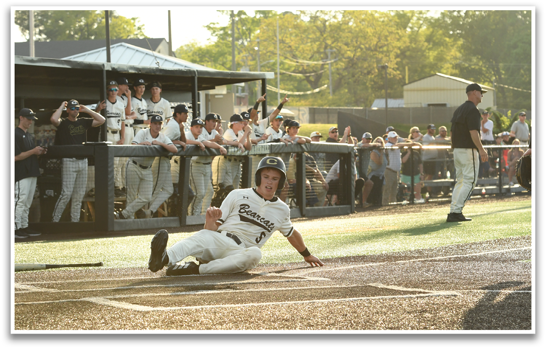 A baseball player slides into home plate, with his teammates watching from the dugout. AI generated content