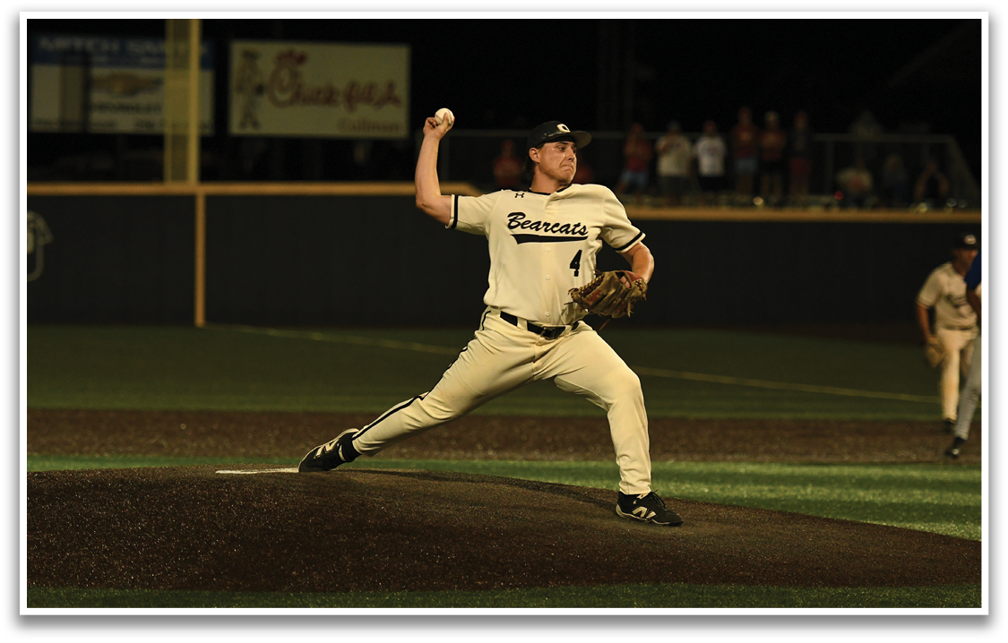 A baseball player in a white uniform is throwing a ball. AI generated content